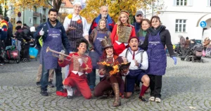 Artisten des Circus Roncalli bringen Zirkusmagie zu den Gästen der Münchner Tafel in Pasing – ein Nachmittag voller Lachen, Staunen und Menschlichkeit